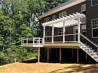 <b>Trex Transcend Havana Gold Decking with White Washington Vinyl Railing and Black Round Aluminum Baluster-Pergola</b>